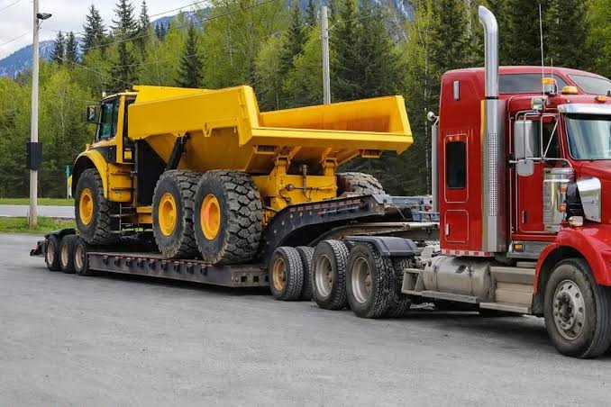 DE LA CRUZ TOWING LLC Equipment Hauling